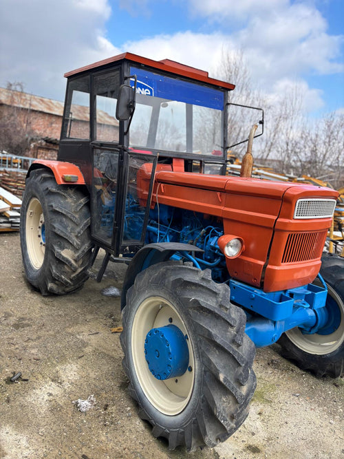 Fiat 85 HP tractor side view with cabin